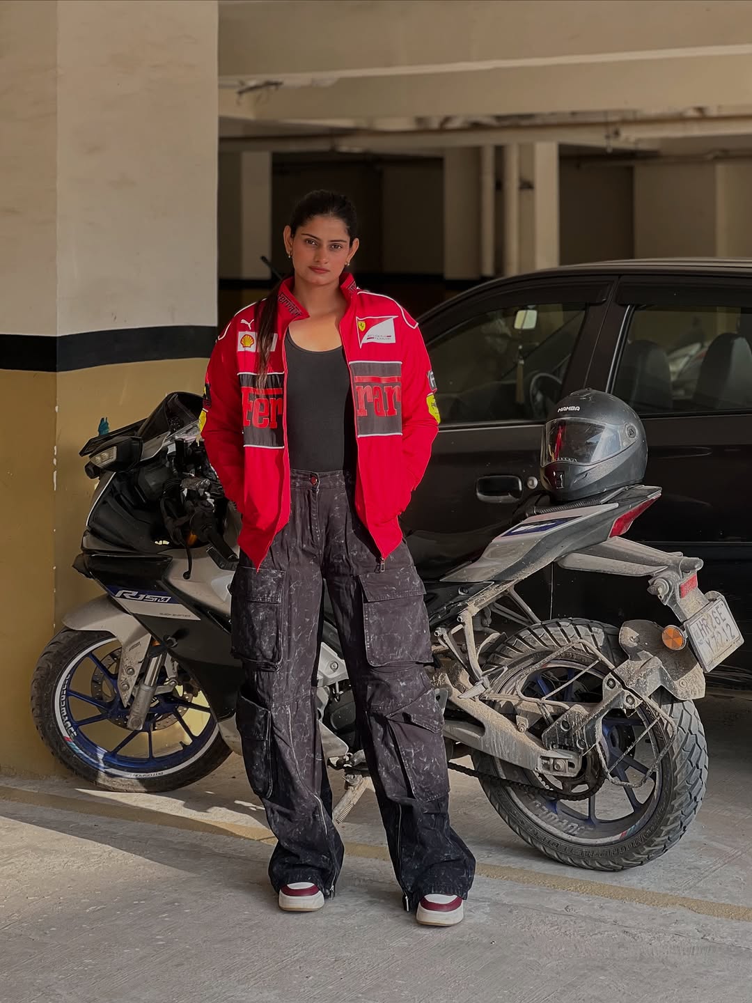 Ferrari racing jacket in red .