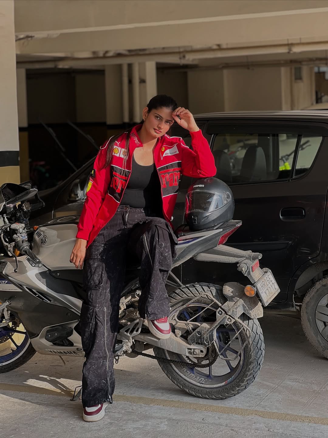 Ferrari racing jacket in red .